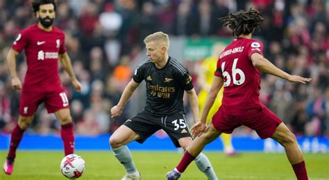 Liverpool blows title race open after thrilling Arsenal draw